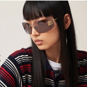 Miu Miu Aube Mauve large Sunglasses